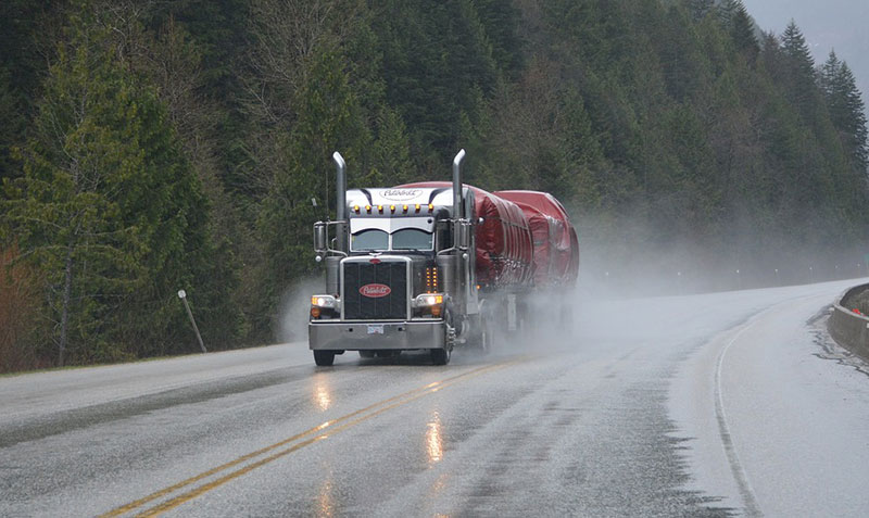 American-Truck-Driving-Through-Rain